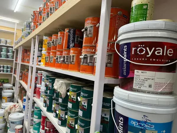 Aisle of Asian Paints pails inside the Skypaint store